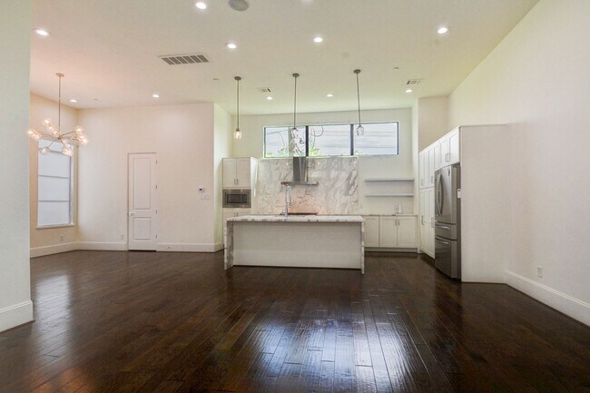 Building Photo - New construction, 4 story home with 3 beds...
