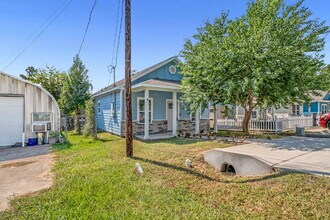 Building Photo - Welcome to this charming Craftsman-style r...