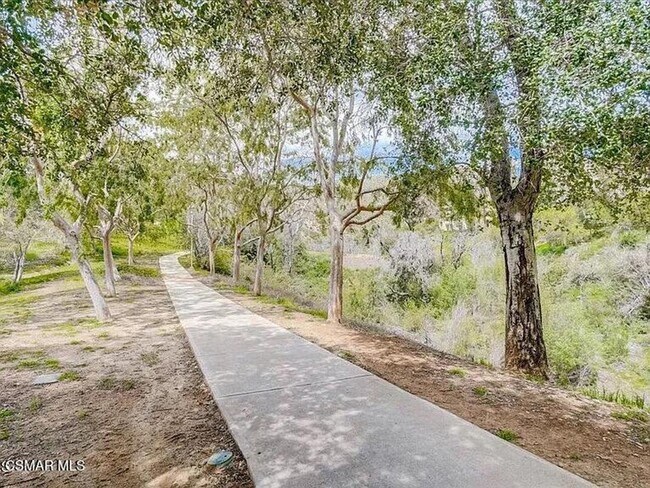 Building Photo - Welcome to this beautifully situated first-floor end unit