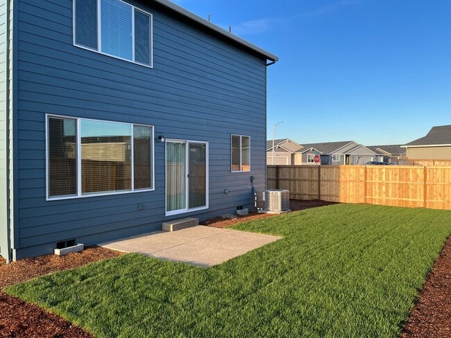 Building Photo - New Construction! Four Bedroom Home in Woo...