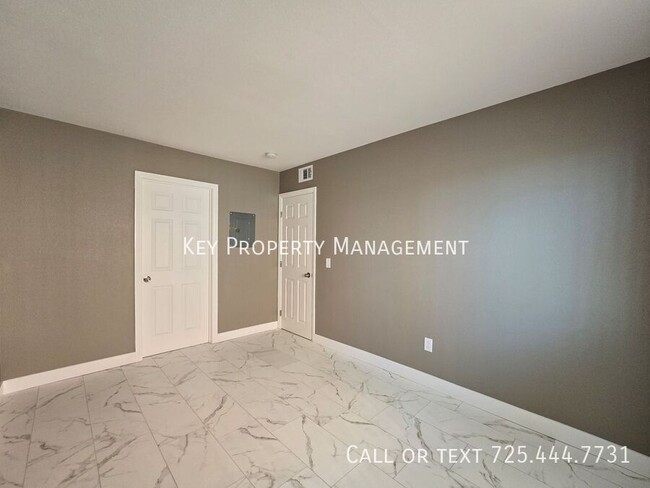 Building Photo - COMPLETELY REMODELED 2BR 1BA CONDO IN N LA...