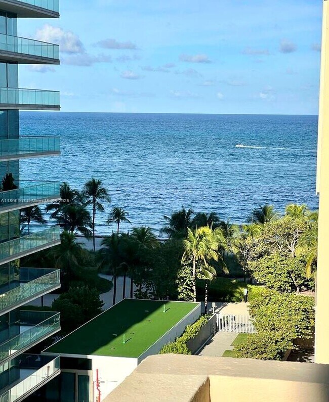 Building Photo - 10185 Collins Ave