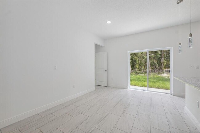 Building Photo - 10089 N Athenia Dr