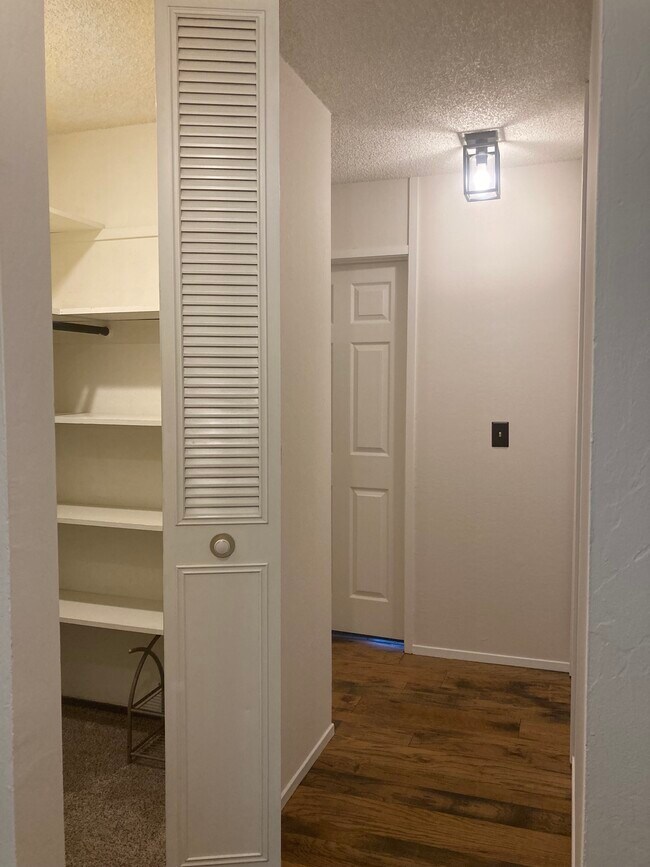 Walk in closet hardwood - 1241 Homestead Ave