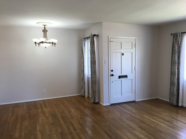 Dining and Living Room with Hardwood Floors - 7823 Midfield Ave