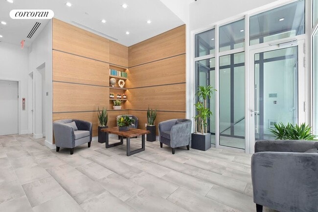 Building Photo - 21-59 44th Drive 2C