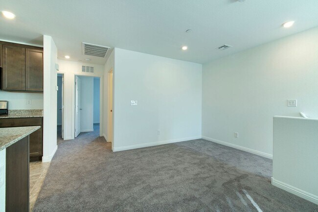 Building Photo - Newer Townhome - 3 Bedrooms + 2 Car Garage - E Craig & Nellis