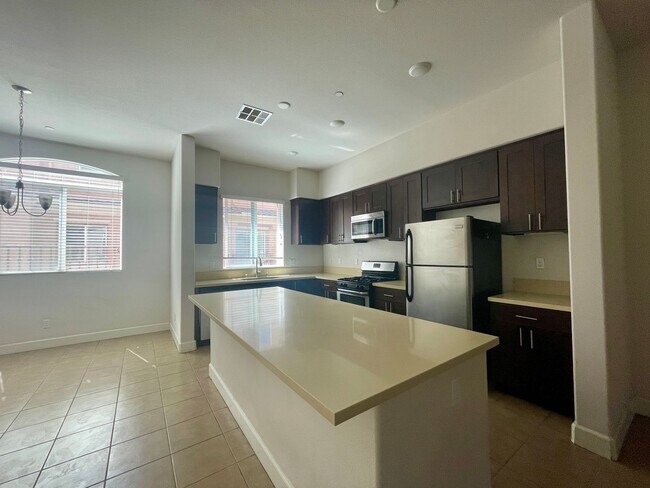 Building Photo - 3 Bed/3 Bath, 2 Garage & 2 Balconies Gated...