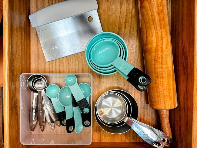 There are plenty of baking accessories and baking pans. - 228 W Lexington Blvd