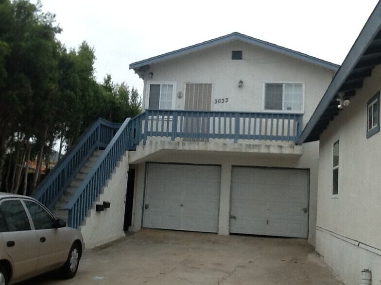 its behind the garage to the right - 3033 Carleton St
