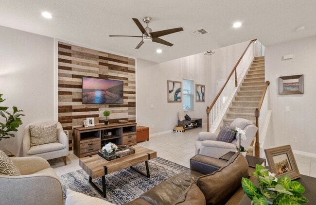 Building Photo - Water Front Home- 4 Large Bedrooms-3 baths Gated Community Call Sheila Campbell 407-687-7900