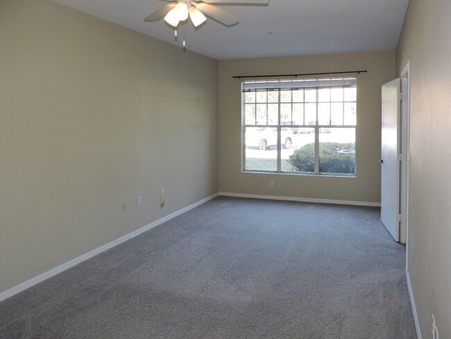Building Photo - 1 bd /  1 ba condo at The Palms Club community