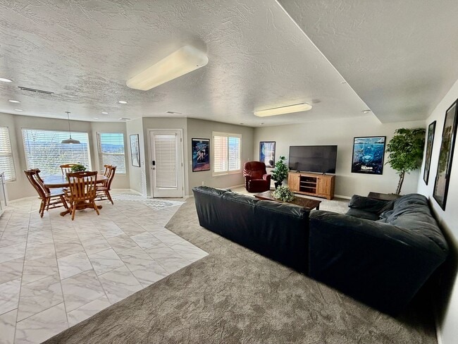 Building Photo - Furnished and Utilities Included: Two-Bedroom Basement Apartment with Private Yard