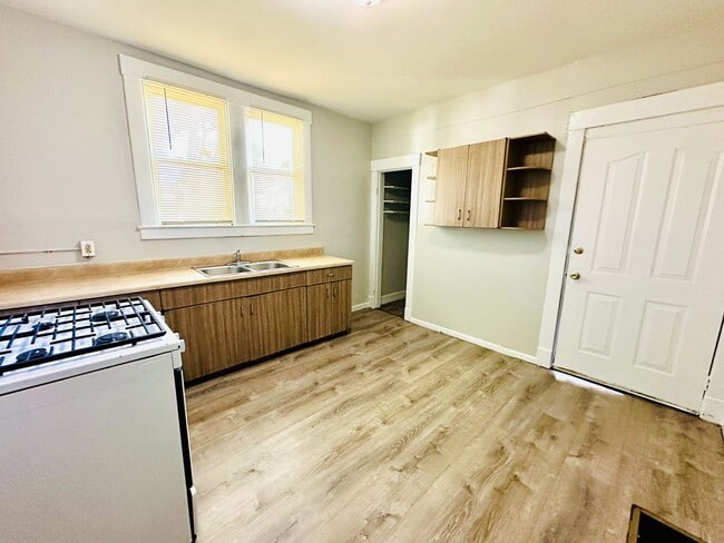 Building Photo - Updated Three Bedroom close to Churchill D...