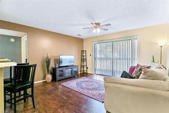 Building Photo - Modern First-Floor with Private Patio in Hampton Club