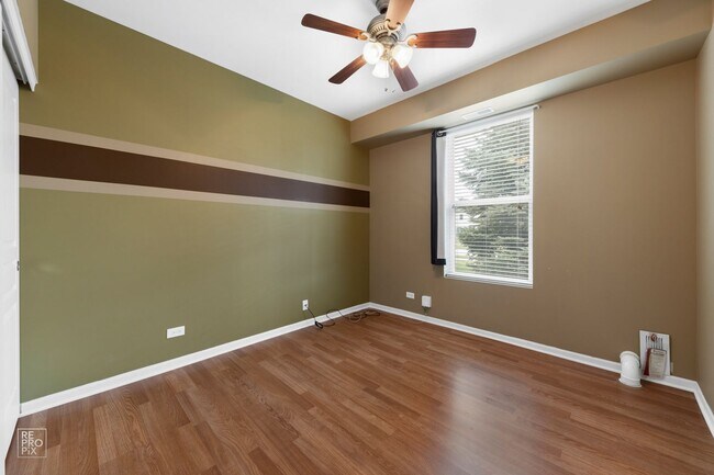 Building Photo - Yorkville First Floor End Unit Two Bed Condo with Pond Views