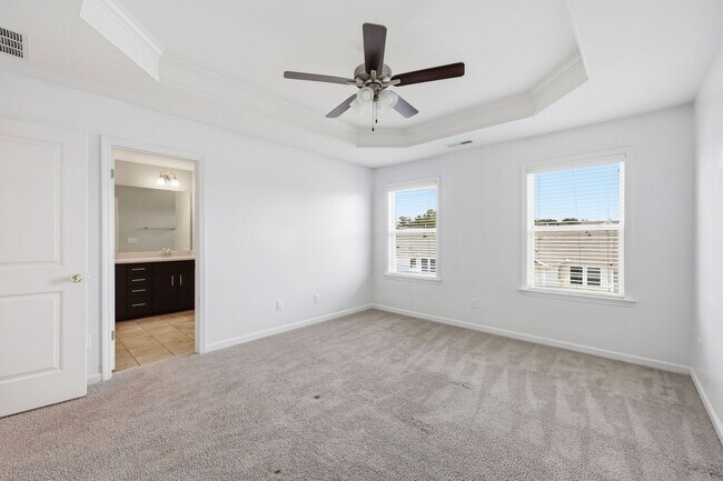 Building Photo - Modern 4BR Townhome with Washer/Dryer & Pet-Friendly Living in Morrisville!