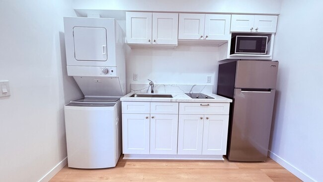 Building Photo - $1,000 of first months rent!!  - Brand New Studio w/ In Unit Washer & Dryer