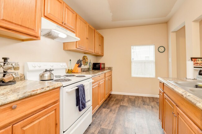 Building Photo - Renovated and Roomy 3 Bedroom Home in the ...
