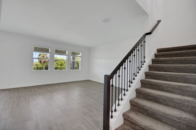 Building Photo - Stunning 4/3 in Gated Dora Parc! Water Views!