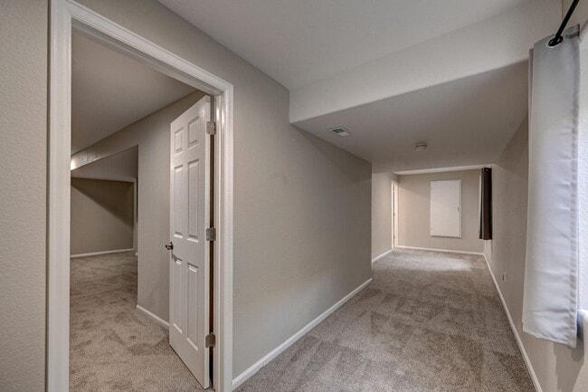 Building Photo - 5 bedroom, 4 bath home with 2 car attached garage