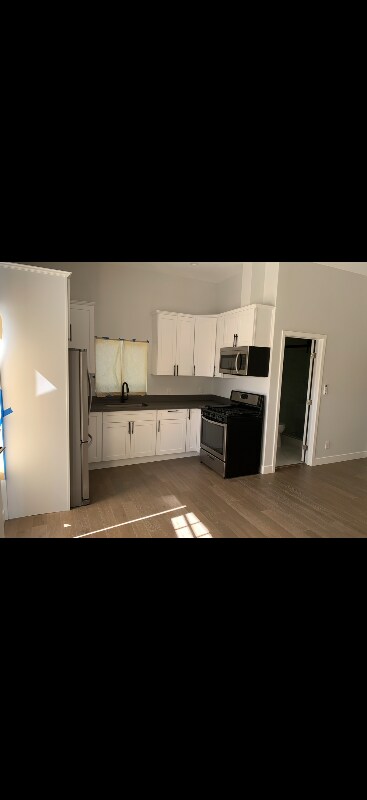 Building Photo - 8456 Darby Ave