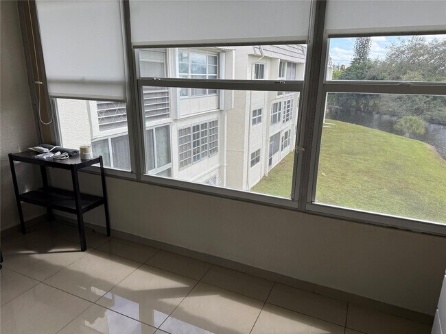 Building Photo - 8135 Sunrise Lakes Blvd