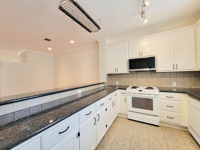 Building Photo - Beautiful Home with a Smart, Functional Fl...