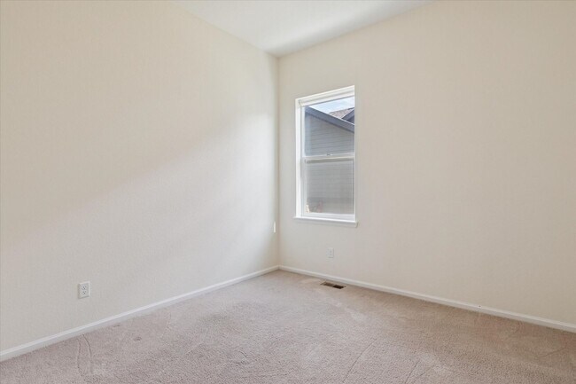 Building Photo - Modern 4-Bed Ranch in Erie with 13-Ft Ceilings, Solar Panels & EV Charger