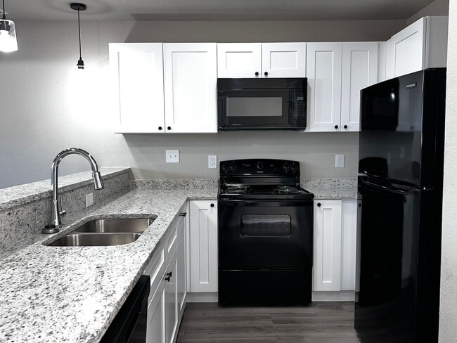 Building Photo - Modern 3BR Townhome w/ Garage, Private Yard & No Carpet – Built 2022