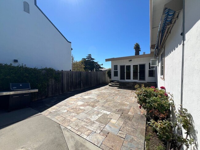 Building Photo - Spacious 4-Bedroom Retreat Just Steps from...
