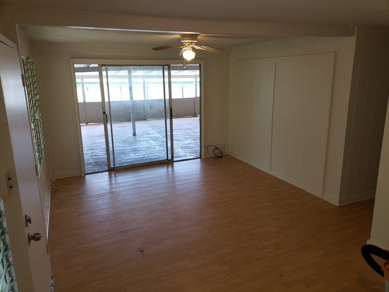 Unit C- View of living room that opens up to the lanai. - 47 -411 Kamehameha Hwy