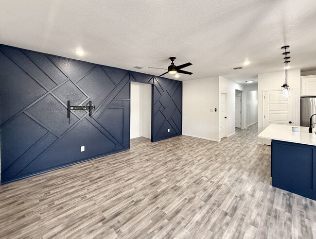 Building Photo - Modern 4-Bedroom Retreat with Patio Deck &...