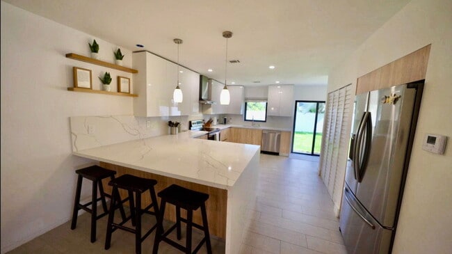 Building Photo - Northeast 27th Avenue, Pompano Beach, FL 33062 - 3 BR 3 BA single-family home