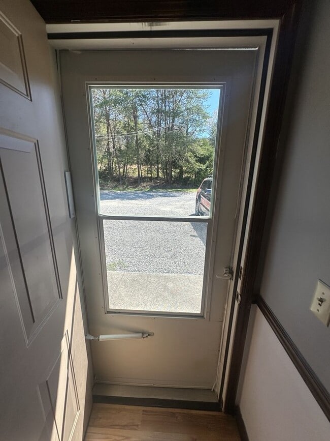 Building Photo - Charming, Light-Filled Retreat with Quiet Comfortable Living