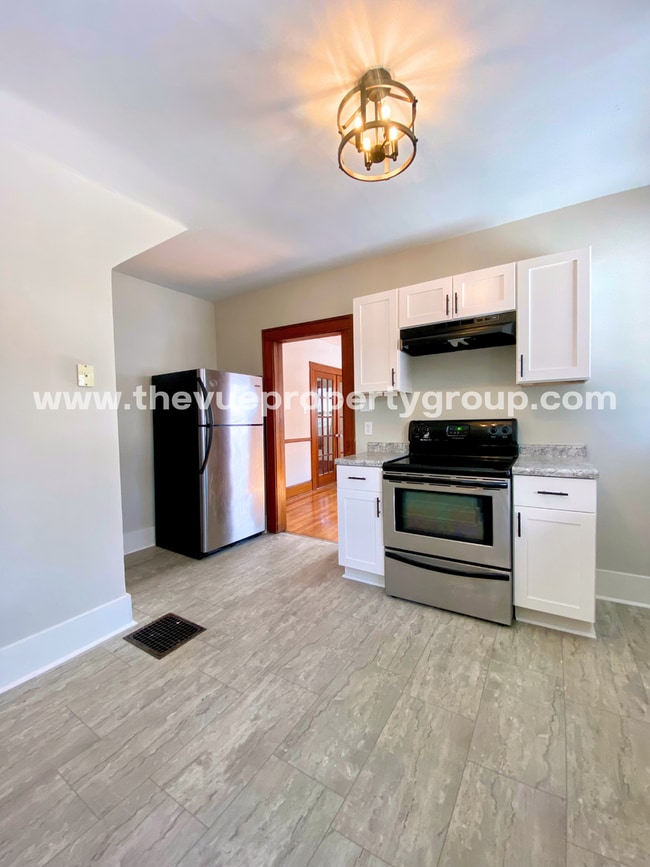 Building Photo - 3BR Beauty with Hardwood Floors + Remodeled Kitchen + Fenced Yard!