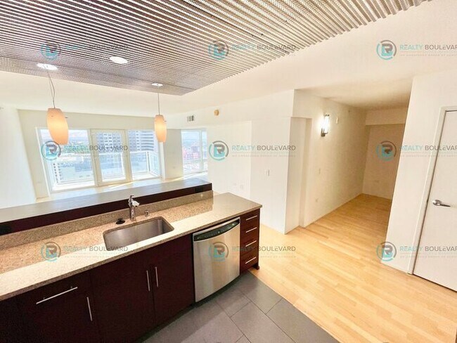 Building Photo - Modern 1 Bedroom 1 Bath Luxury Condo at Th...