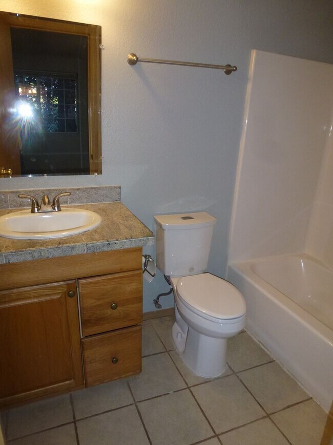 Building Photo - Spacious Townhome Nestled Down Private Drive