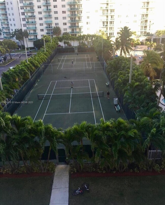 Building Photo - 19380 Collins Ave