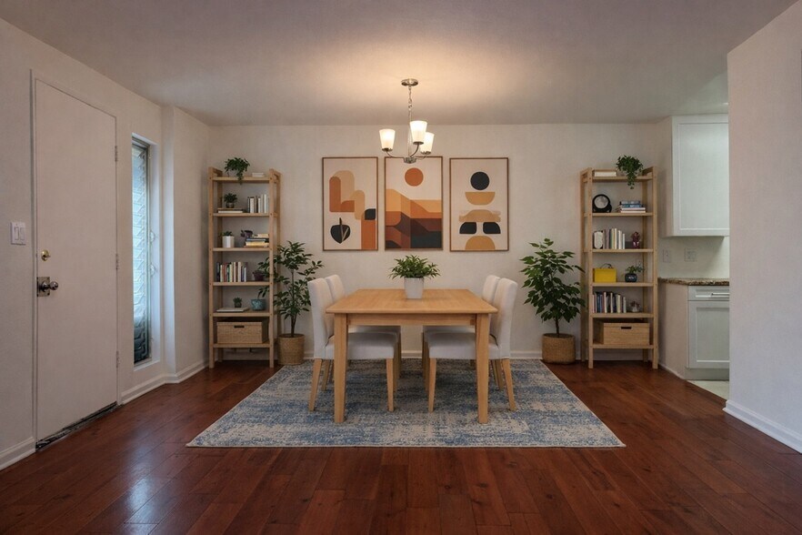 Open dining area with chandelier — flows directly into the living room and kitchen - 970 Palm Avenue