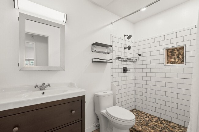 Building Photo - ***MOVE IN SPECIAL*** Modern 3BR Townhome | Garage + Driveway Parking | Yard | Pool | Pet Friendl...