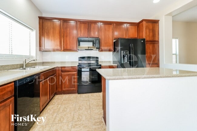 Building Photo - 10946 W College Dr