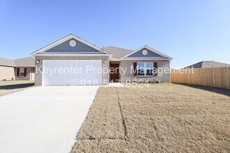 Building Photo - New Build 3 Bedroom 2 Bath available 6/1 in Robninson Ranch!