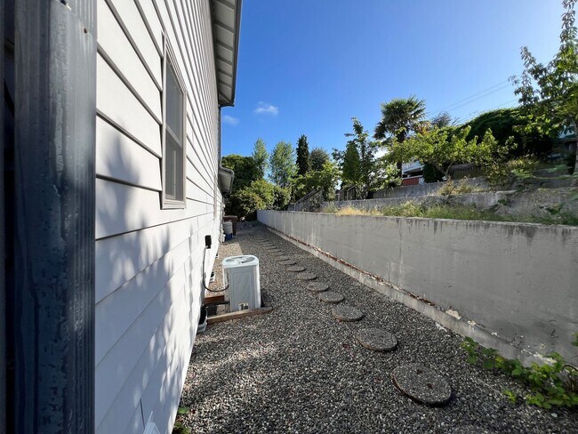 Building Photo - Stunning 4 Bedroom 2.5 Bath with Peek-a-Boo View of Puget Sound