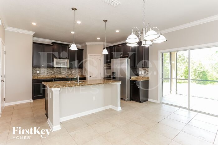 Building Photo - 9019 Devon Pines Dr