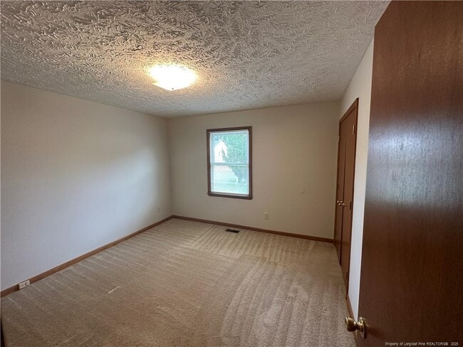 Building Photo - 8516 Amish Dr