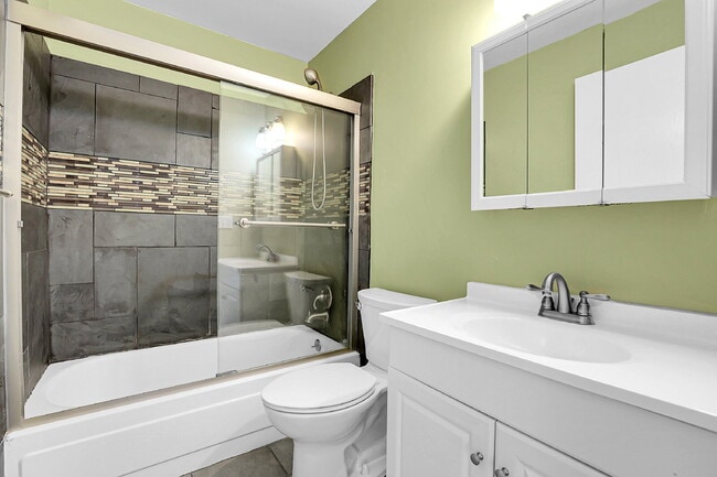Building Photo - $2,720.95 - 4 bed, 2 bath, located in Aurora with attached Garage and In Unit Washer and Dryer!