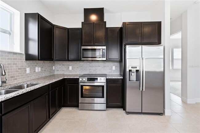 Building Photo - 13030 Stoddart Ave