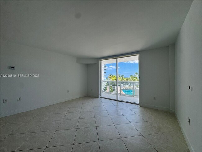Building Photo - 10275 Collins Ave