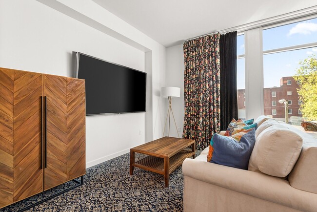 Building Photo - Fully Furnished Studio Condo at The Adelicia